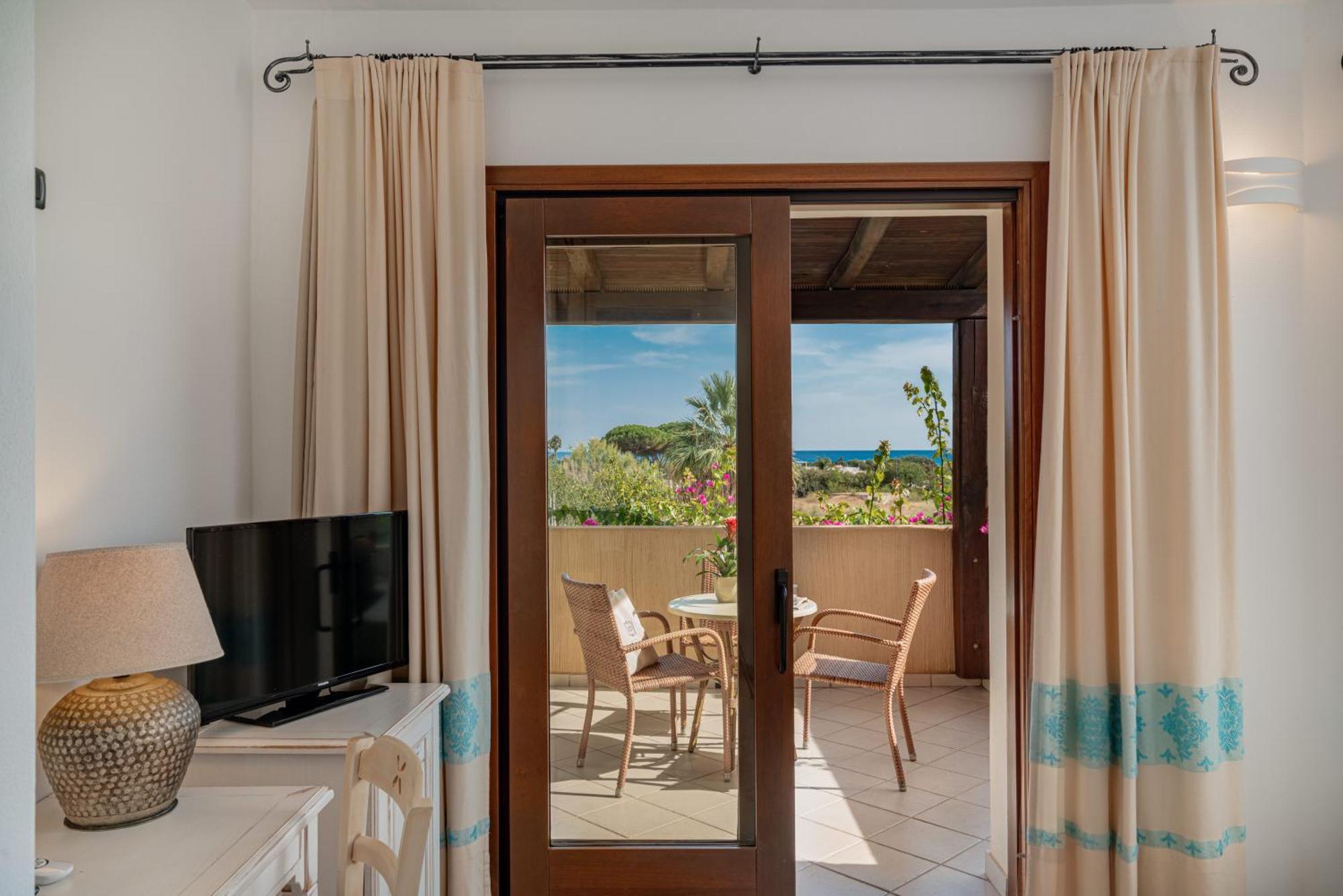 Hotel Mariposas Villasimius Bagian luar foto
